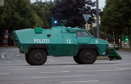 A police vehicle is seen near a shopping mall (the Olympia Einkaufzentrum (OEZ) ) in Munich on July 22, 2016 following shootings. German police were hunting for three gunmen who went on a shooting rampage in a Munich mall on Friday, killing eight people in what was described as a suspected terror attack. / AFP / STR        (Photo credit should read STR/AFP/Getty Images)